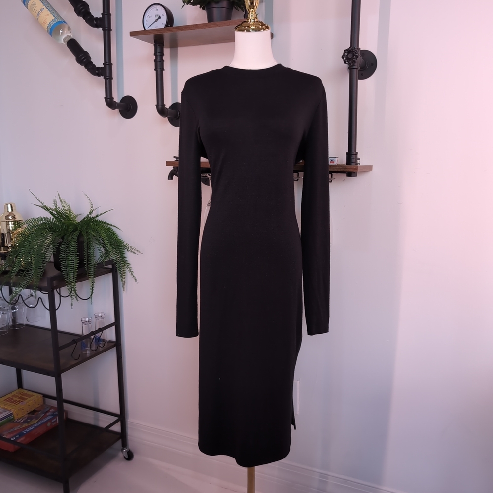 Streamlined Prologue Knit Midi Dress in Black. Perfect for Office Siren